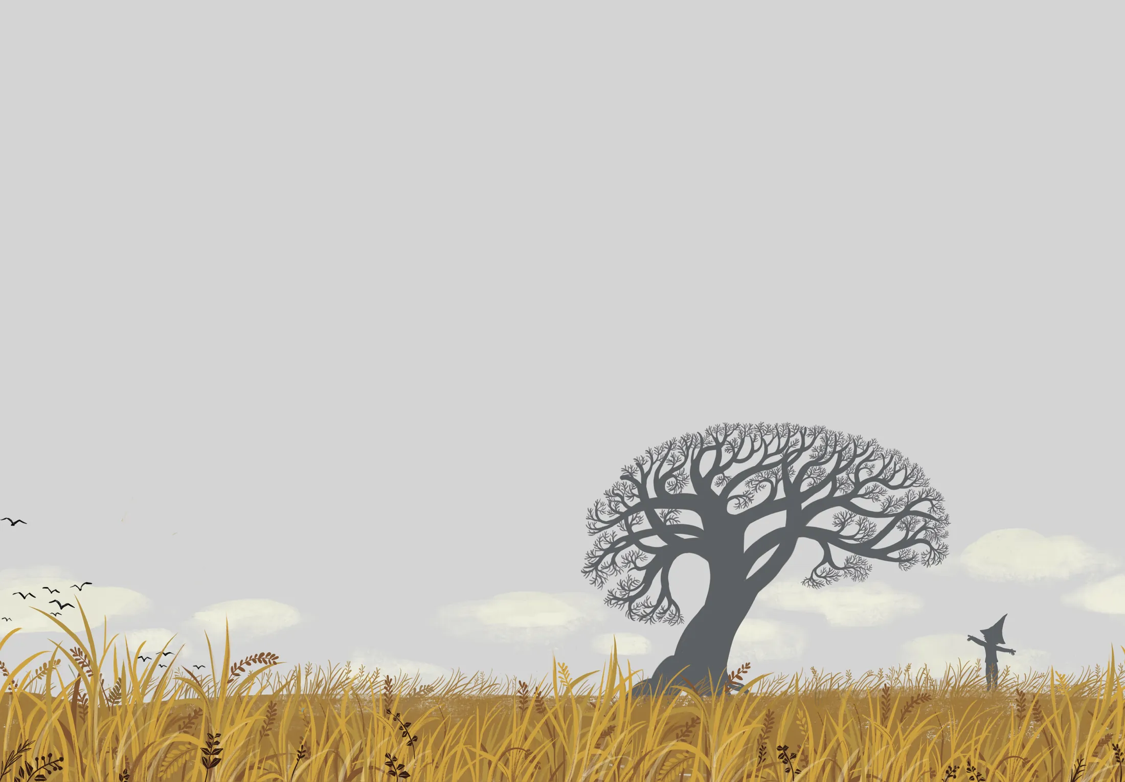 Un árbol solo en mitad de un campo de trigo